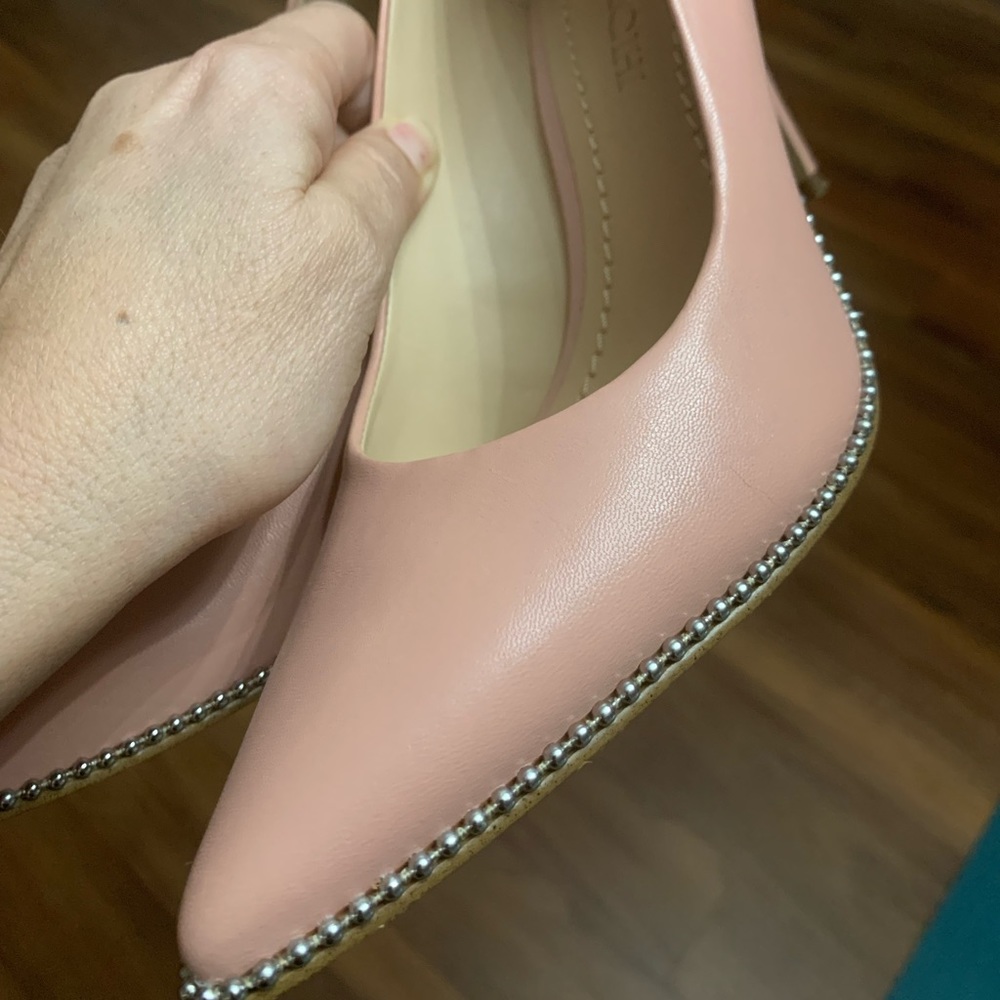 Coach size 7 pump. Pink! Perfect for your spring wardrobe.